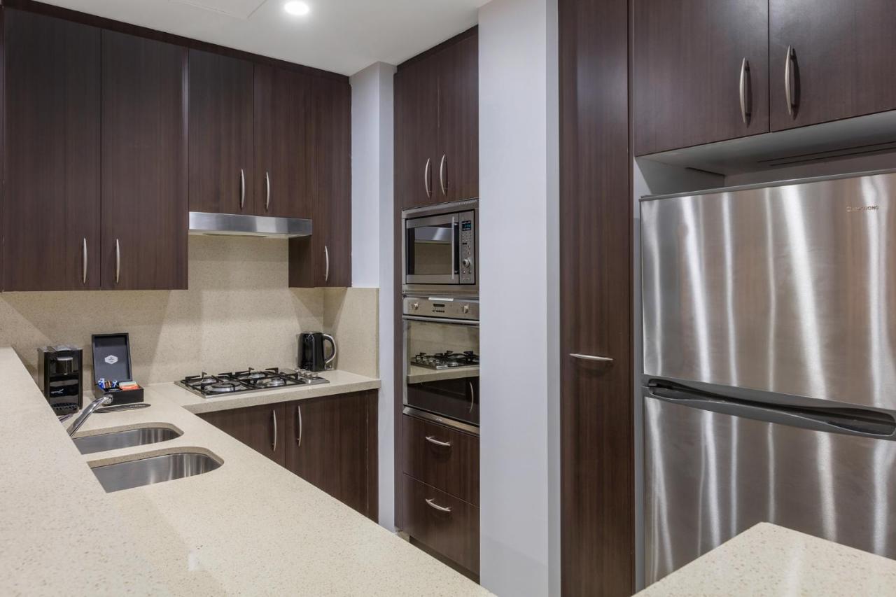 Meriton Suites Pitt Street, Sydney Exterior photo A kitchen in a typical apartment